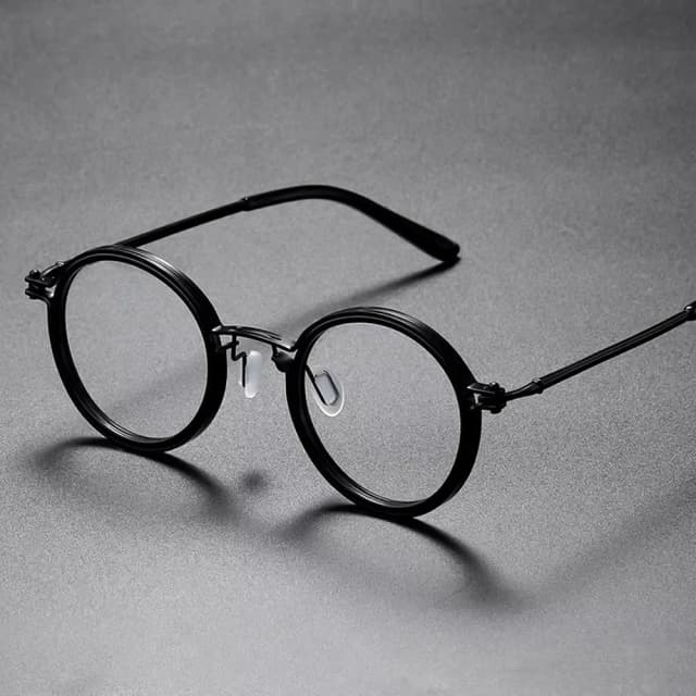 artistic-sweeping-black-retro-round-glasses